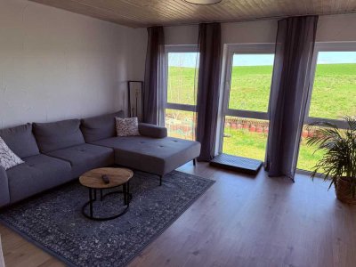 Sanierte Wohnung mit drei Zimmern sowie Balkon und Einbauküche in Wierschem