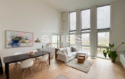 Großzügiges 4-Zimmer- Penthouse mit moderner Architektur und Blick auf den Küstenkanal