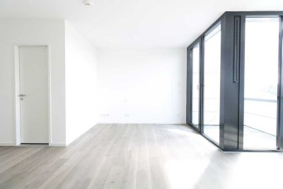 Sonnenverwöhnte 1-Zimmerwohnung mit eleganter Markenküche & gemütlicher Loggia!