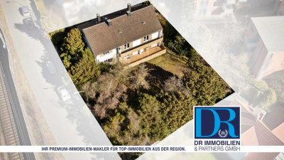 Renovierungsbedürftiges MFH mit 1.004 m² Grundstück und genehmigter Planung 10 WE in zentraler Lage