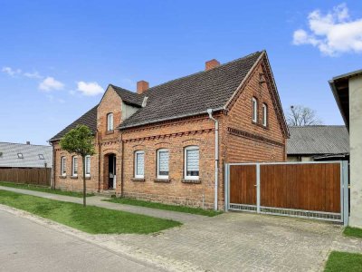Beginnen Sie Ihr neues Leben in einem charmanten Einfamilienhaus mit charakteristischen Backsteinen!