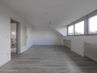 Großzügige 2-Zimmer-Wohnung mit Garage in Verkehrsgünstiger
Lage !