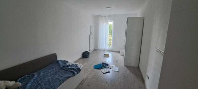 3 ZKB mit Terrasse, Fernblick, Einbauküche und TG Stellplatz ODER 3Zimmer WG Option