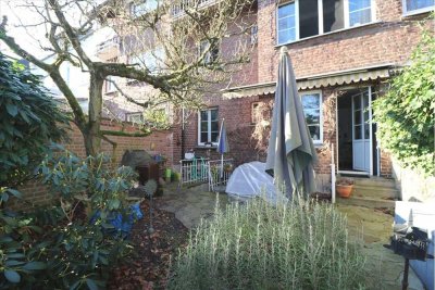 Charmante 4 Zimmer Altbauwohnung über zwei Ebenen mit Terrasse & Garten – Gutenbergstraße