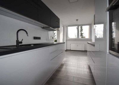 Sanierte 3-Zimmer-Wohnung mit Einbauküche und TG-Stellplatz in Unterschleißheim-Lohhof