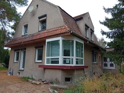 Ausbauhaus auf großem Grundstück