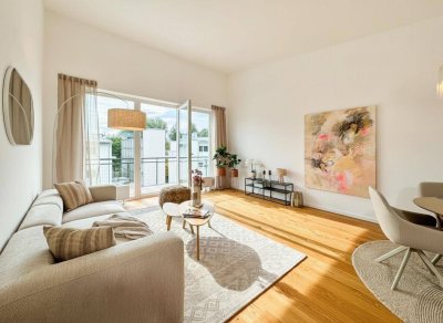 Lichtdurchflutete Dachgeschosswohnung mit Balkon und Tiefgaragenstellplatz