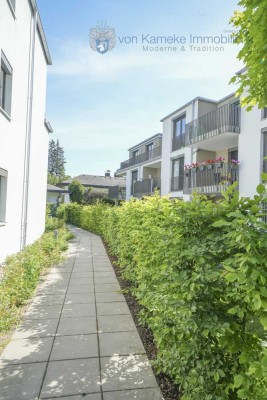 Wohnen am Mühlweiher: Exklusive 2-Zi.-Whg. mit EBK, Garten & TG-Stellplatz