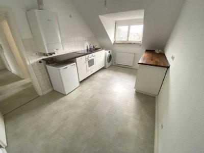 5801 - Gemütliche Dachgeschosswohnung mit EBK in Mühlburg!