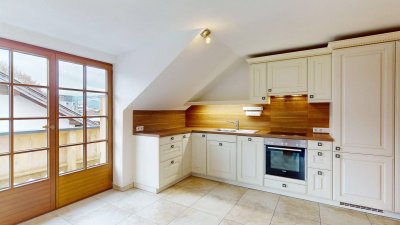 Dachgeschoßwohnung im Herzen von St. Johann in Tirol