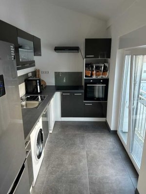 Stilvolle, neuwertige 2-Zimmer-Wohnung mit Einbauküche in Nußloch