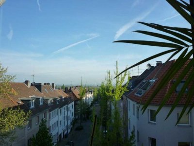 Charmante lichtdurchflutete  Eigentumswohnung mit Dachterrasse in Südlage