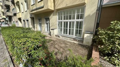 4-Zimmer Erdgeschoß mit Wintergarten und Gartensondernutzung nähe Schloßstraße