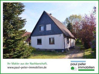 Modernisierungsbedürftiges Einfamilienhaus auf großem Grundstück in ruhiger Lage in Boostedt