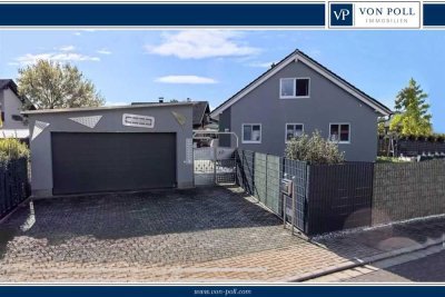 Familienfreundliches Einfamilienhaus mit Doppelgarage und schöner Außenanlage