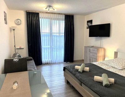 CHARMANTES APPARTEMENT mit unverbaubarem Bergpanorama und eigener Gartenterrasse