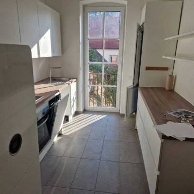 Kernsanierte Wohnung am Petrusplatz mit großem Balkon