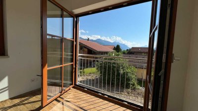 Neubauwohnung mit Bergblick und Süd-Garten
