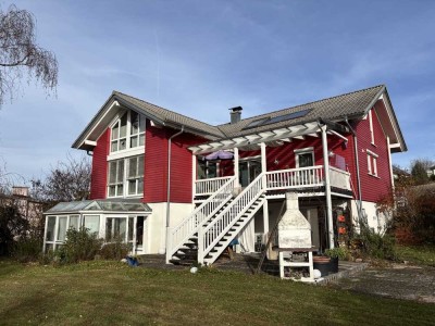 Ein- bis Zweifamilienhaus Holzbauweise mit 9 Zimmern in Kandern-Wollbach