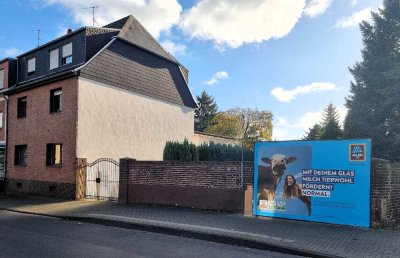 **Mehrfamilienhaus mit Baugrundstück**