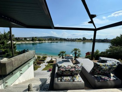 Architektonisches Seehaus mit privater Uferlinie – diskrete Luxusimmobilie in Ruhelage
