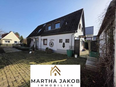 Siedlungshaus mit großem Grundstück, zwei Gartenhäusern und Platz für Kreativität & Handwerk!