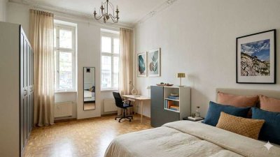 Erdgeschosswohnung mit 3 Zimmern, hohen Decken und kleiner Terrasse