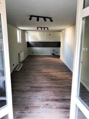 Helles Apartment mit  Einbauküche, Terrasse und Tiefgaragenstellplatz in verkehrsgünstiger Lage