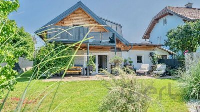 Großzügiges 7-Zimmer-Einfamilienhaus mit mediterranem Gartenparadies