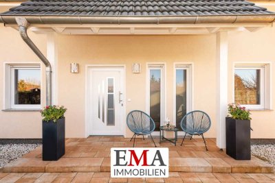 Stilvoll und nachhaltig: Modernes Einfamilienhaus mit sonnigem Gartenparadies