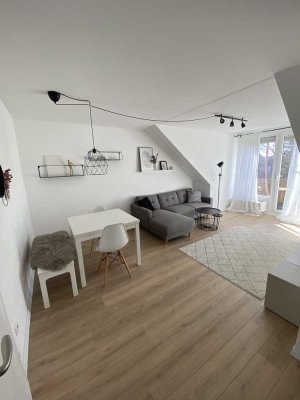 2-Zimmer Dachgeschosswohnung mit Balkon in Martinsried (Planegg)