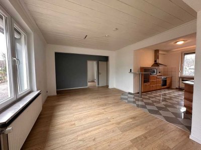 Erdgeschosswohnung mit Terrasse