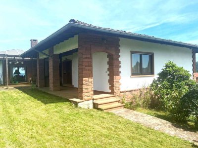 Bungalow in Traumlage inklusive  2 Bauplätze!