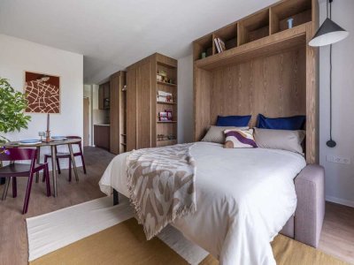 Möblierte Studio Wohnungen mit Gemeinschaftsflächen: Padelplatz, Fitness, Dachterrasse & mehr