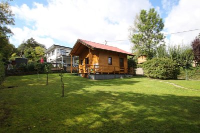 Kleingarten - Grundstück - mit neuwertigem Holzhaus -ganzjähriges Wohnen