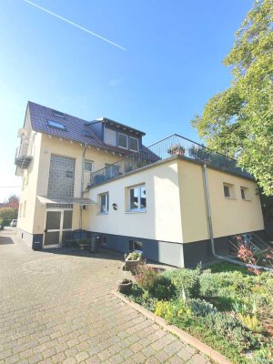Sehr gepflegtes und attraktives Wohn- und Geschäftshaus nach KfW 70 Standard auf Erbpachtgrundstück