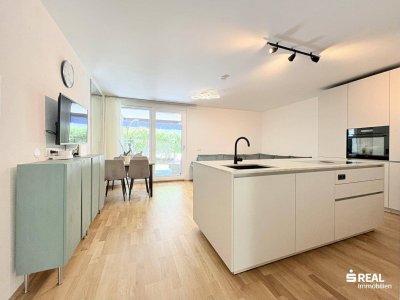 Neuwertige Gartenwohnung mit Keller und Tiefgaragenstellplatz (optional)