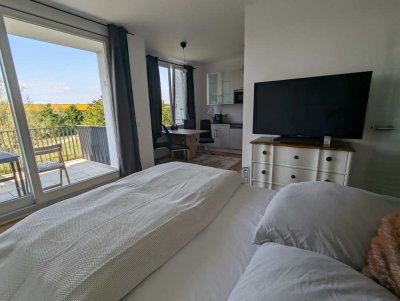 Moderne, voll möblierte 1-Zimmer Wohnung in Neuhausen mit großem Balkon und Fußbodenheizung