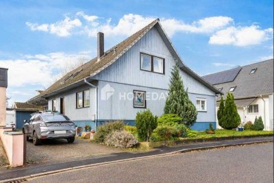 Ihr neues Zuhause für die Familie: Großzügiges Haus mit Garten, Garagen und Gestaltungsspielraum