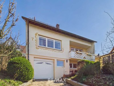 Gartenidylle mit Zukunft – Zweifamilienhaus mit Teich, Potenzial & Herz in Lichtenwald