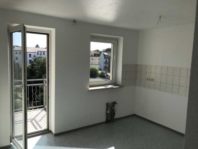 Sehr schöne DG-Wohnung mit Balkon und Stellplatz