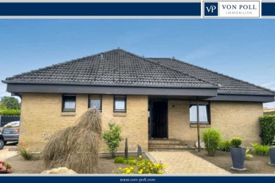 Ein lichterfüllter Bungalow mit Kamin und großem Garten wartet auf Sie
