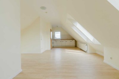 1-Zimmer Dachgeschosswohnung im Herzen von Syke-Barrien mit Carport-Stellplatz