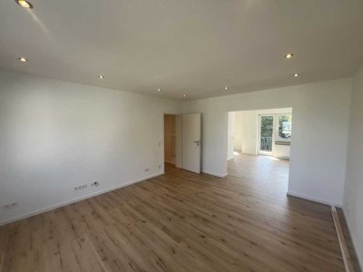 4 Zimmer Maisonette Wohnung mit Balkon, 2 Bäder & Gartenanteil - ERSTBEZUG nach Sanierung
