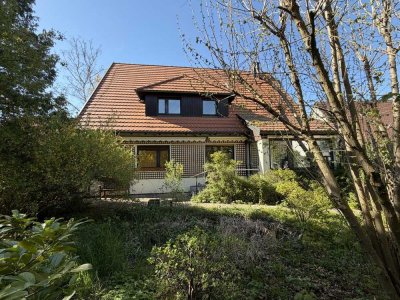 Großzügiges Einfamilienhaus mit weitläufigem, parkähnlichem Gartengrundstück