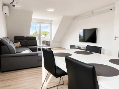 3-Zimmer-Maisonette mit Süd-West-Balkon, Klimaanlage, Wallbox & 2 Stellplätzen