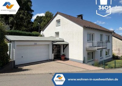 VR IMMO: Gepflegtes Zweifamilienhaus mit Doppelgarage