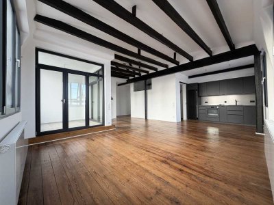 Kernsanierte Bandfabrik, Dachgeschosswohnung mit Loggia