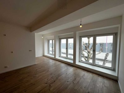 Moderne 1,5-Zimmer-Wohnung mit französischen Balkonen und Einbauküche im Herzen von Düren