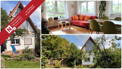 Einfamilienhaus mit Garage und großem Eigentumsgrundstück in Toplage